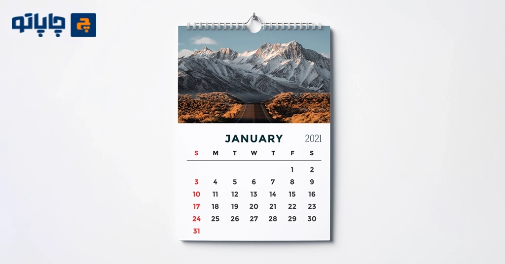 چاپ تقویم دیواری با تصویر یک تقویم دیواری روی دیوار سفید